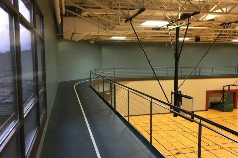 Community fitness center interior with freshly painted walls and ceiling
